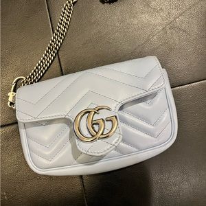 Authentic gucci baby blue purse.matching ahoes also being sold.gently used